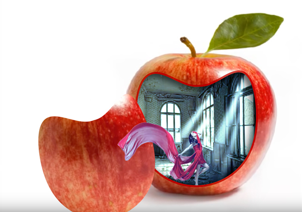 An apple in which there's an opening to a room in which stands a woman with a long dress blowing in the wind