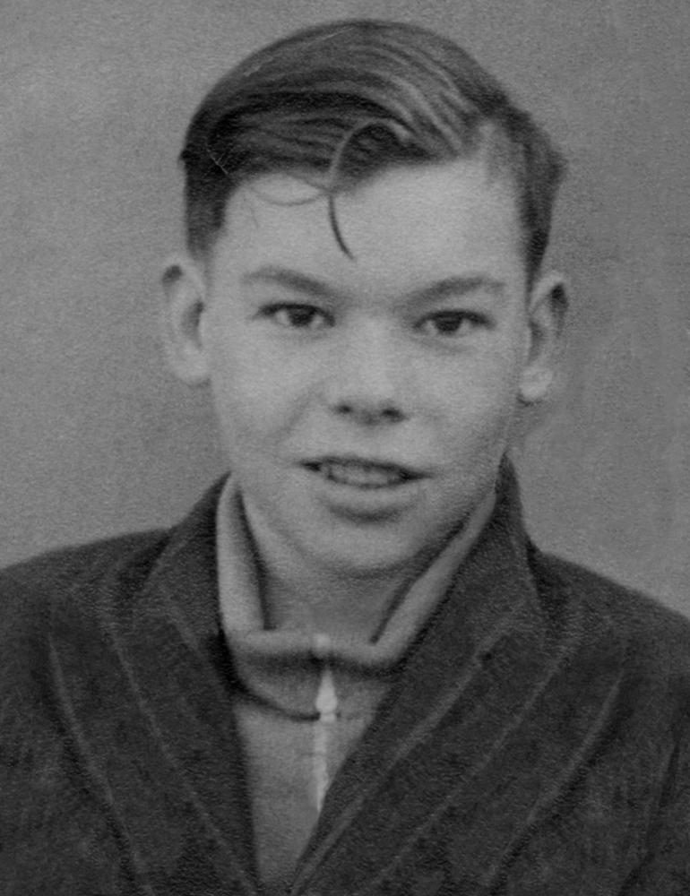 an old, black and white photo of an adolescent human